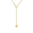Gold chain with a single ball end on a white background