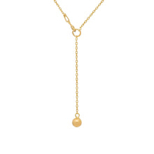 Gold chain with a single ball end on a white background