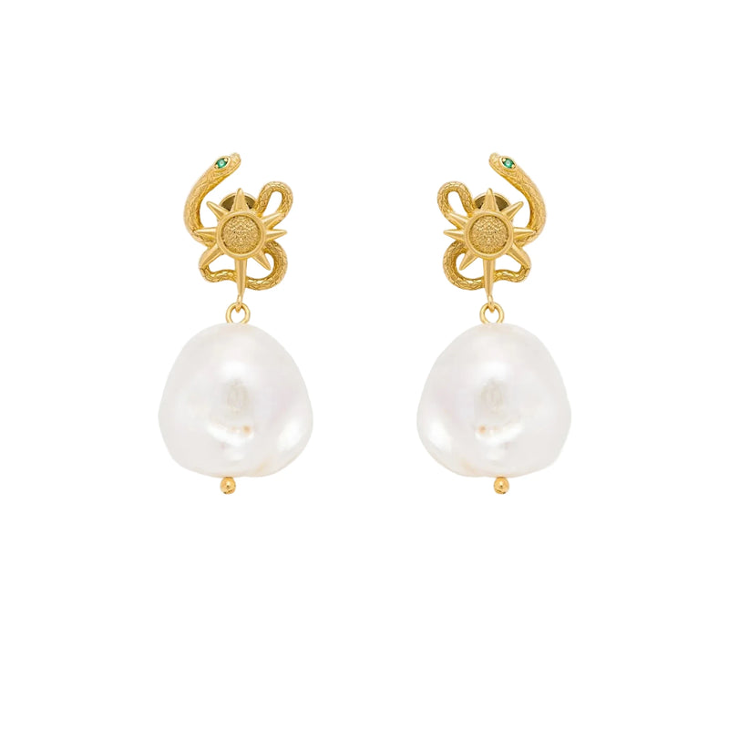 Gold serpent earrings with pearl drops on a white background
