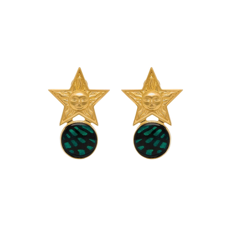 Gold star earrings with green circular centers on a white background