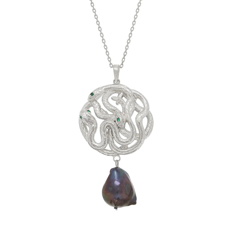 Silver necklace with a serpent pendant and a black pearl on a white background