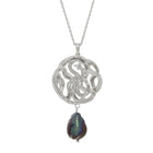 Silver necklace with a serpent pendant and a black pearl on a white background