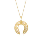 Gold necklace with a decorative pendant on a white background