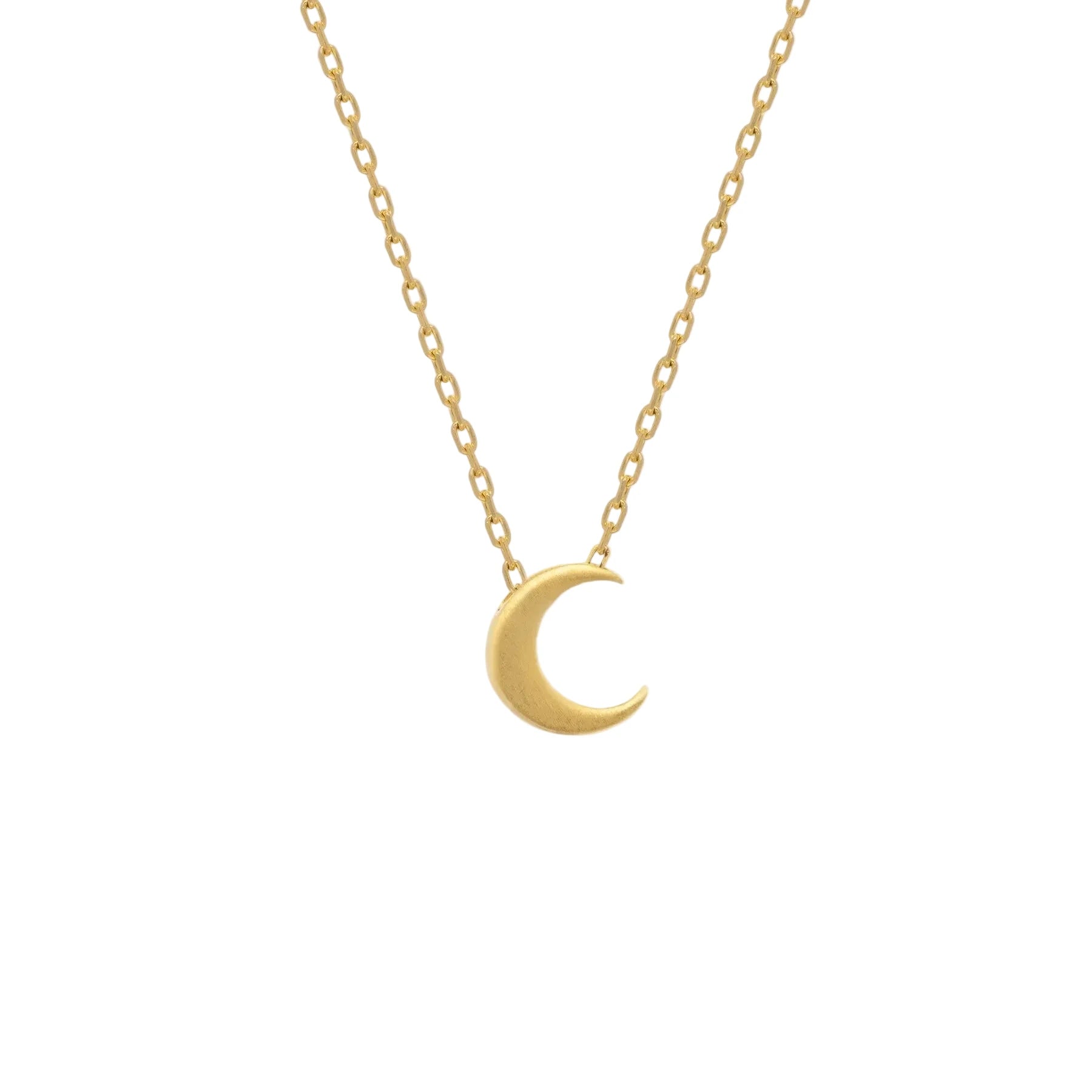 Gold necklace with a crescent moon pendant on a white background