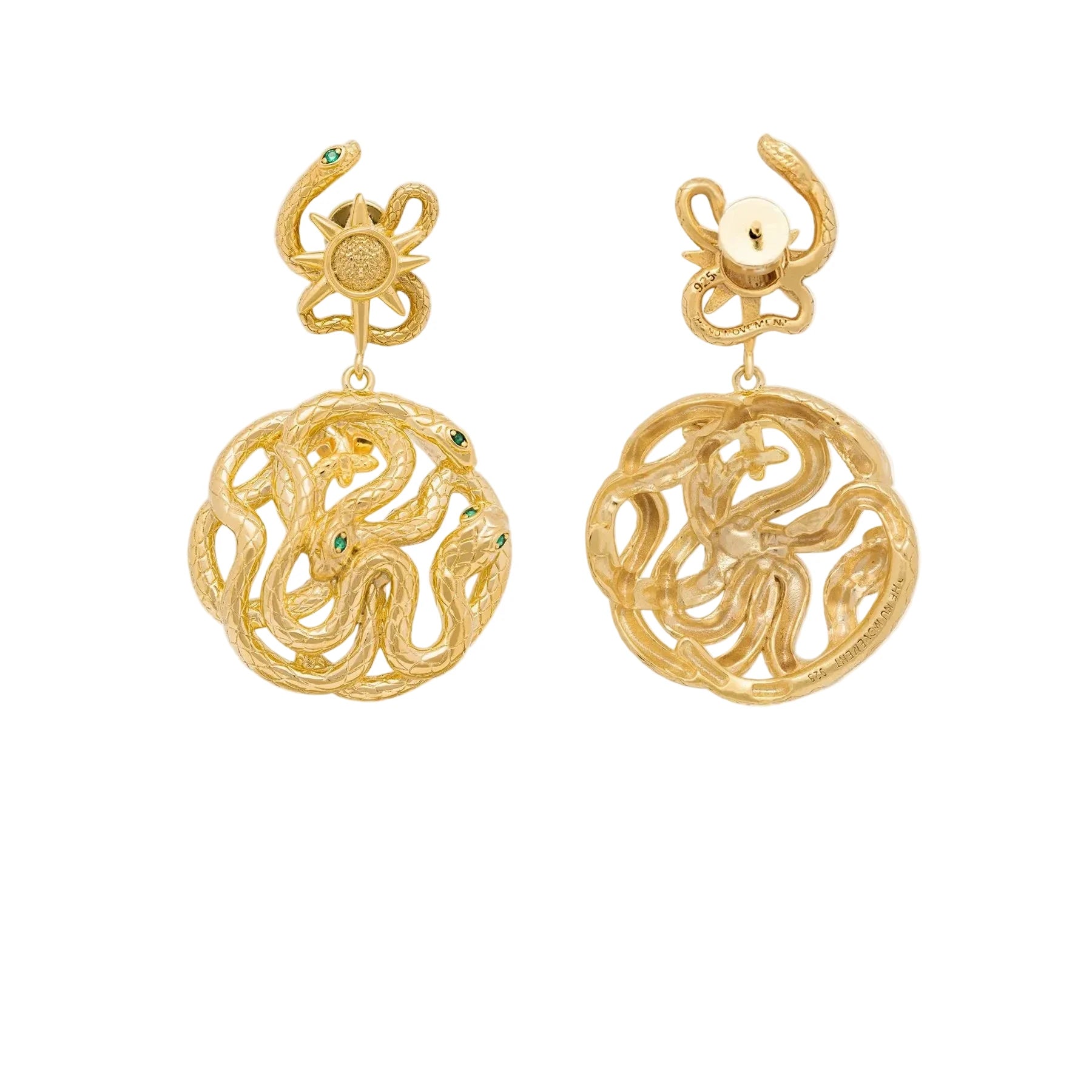 gold story earring with serpent light sun and star