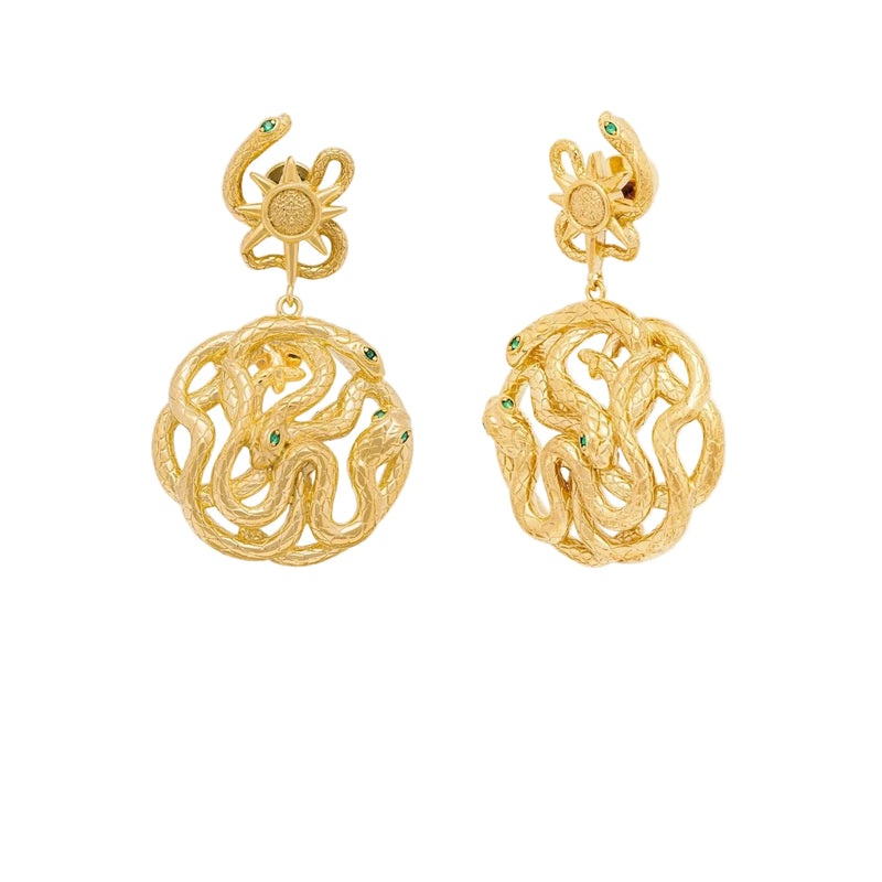 gold story earring with serpent light sun and star