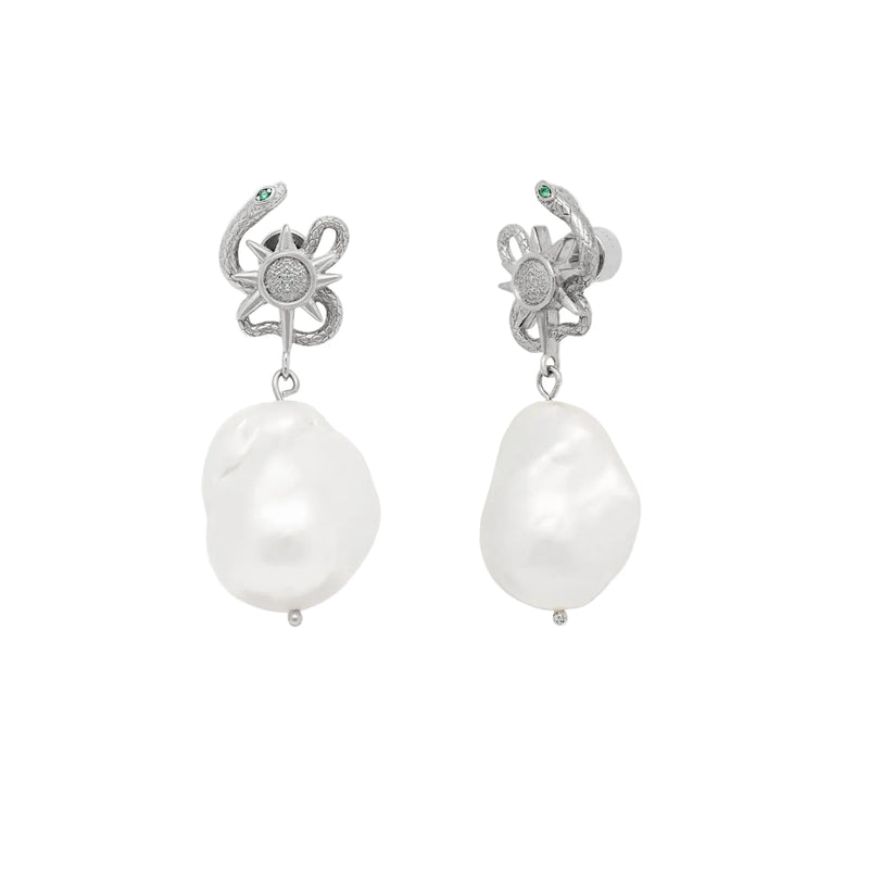 Pair of pearl earrings with silver snake designs on a white background