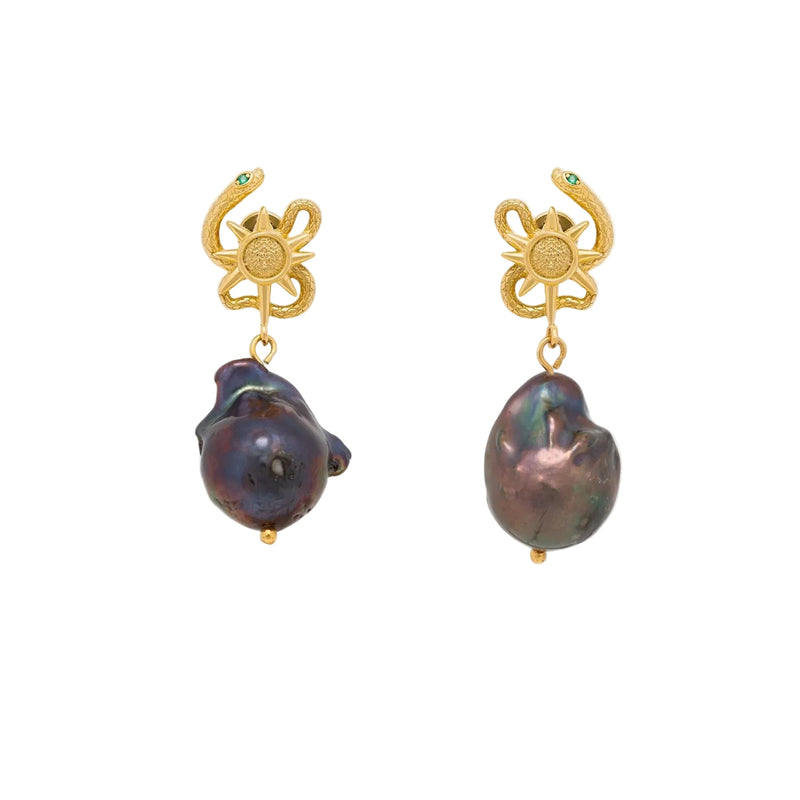 Pair of earrings with gold hooks and dark pearls on a white background